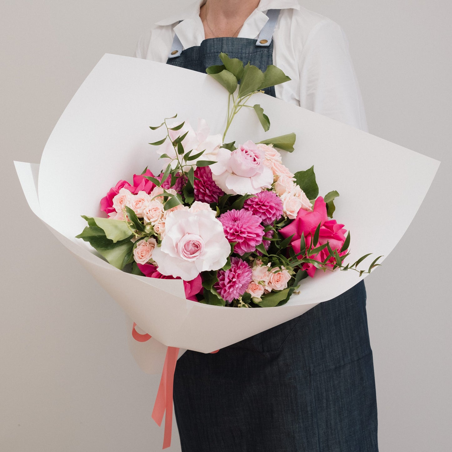 Bright seasonal flowers bouquet with bold and pastel blooms