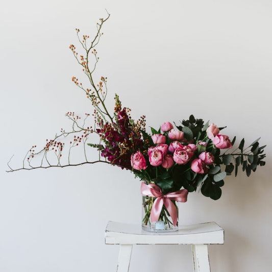 Amboise modern vase arrangement with roses and foliage