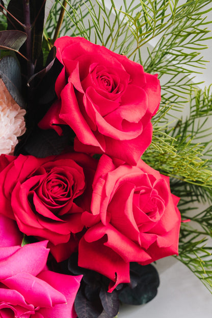 Forward facing modern flower arrangement with long stems