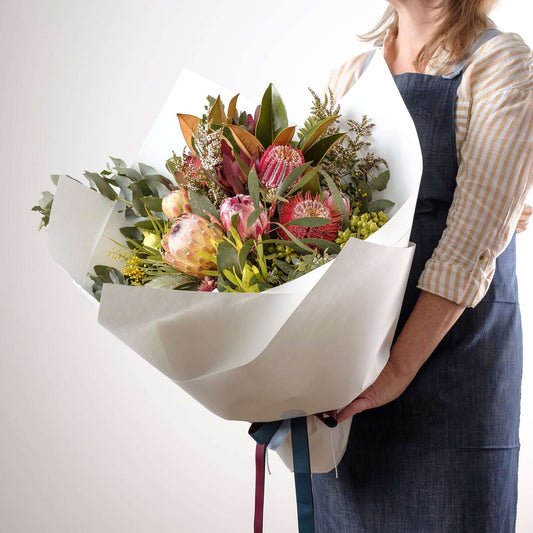 Native flower bouquet with protea, banksia, and foliage