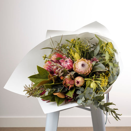 Rustic native flowers wrapped in white paper Melbourne delivery